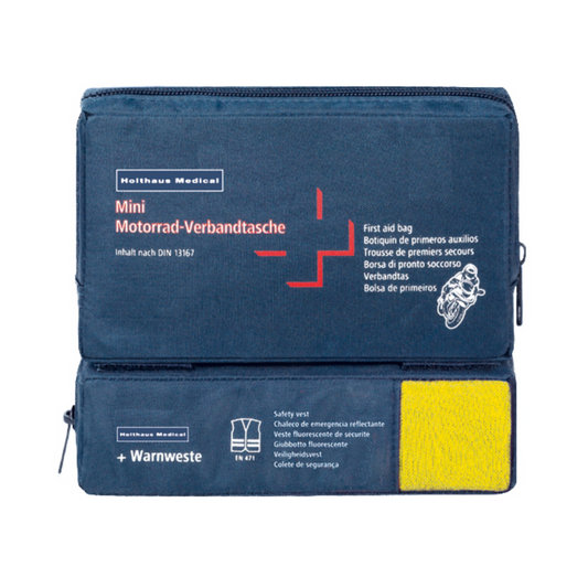 Eine blaue Holthaus Medical Mini Combi Verbandtasche Motorrad mit mehrsprachigen Beschreibungen, Warnwestensymbolen und Fächern mit Reißverschluss.