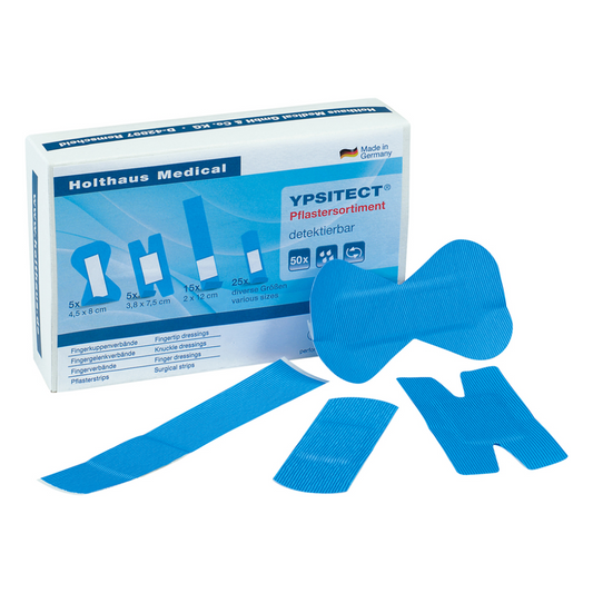 Beschreibung: Eine Schachtel mit detektierbaren blauen Pflastern aus dem Holthaus Medical Holthaus YPSITECT® Pflastersortiment, dargestellt mit.