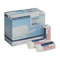 Image of a box of Holthaus Ypsifix® fixation bandages from Holthaus Medical GmbH & Co. KG, 8 cm x 4 m. The box contains 20 individual bandages. Three individual bandages are shown on the front of the box; two are shrink-wrapped in plastic, while one is partially unwrapped. Made in Germany, perfect for securing wound dressings.