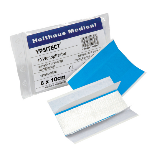 Eine Schachtel Holthaus Medical Ypsitect® Wundpflaster mit 10 Wundauflagen ist teilweise geöffnet, ein Pflaster ist zur Hälfte herausgezogen. Der Hintergrund ist schlicht weiß.