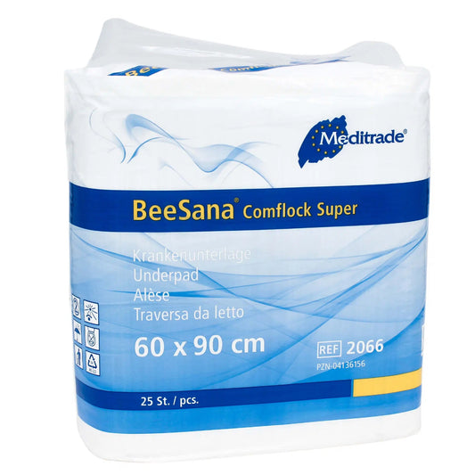 Eine Packung Meditrade BeeSana® Comflock Super Bettunterlagen in einer Plastikfolie, beschriftet in verschiedenen Sprachen, mit der Angabe der Größe 60 x 90 cm und einer Menge von 25 B