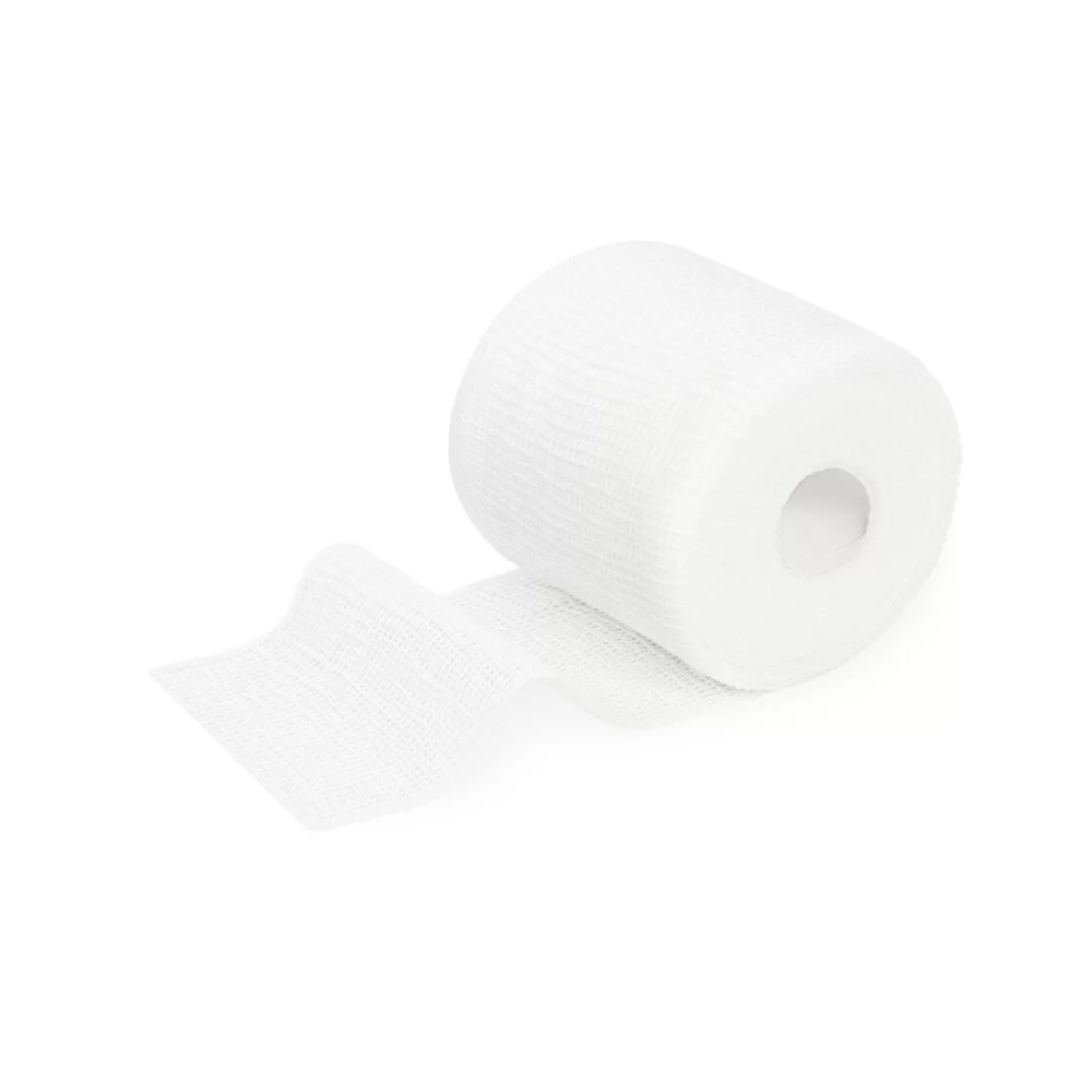 A single roll of white Meditrade ABE® Last® fixation bandage with some unrolled sheets, isolated on a white background.