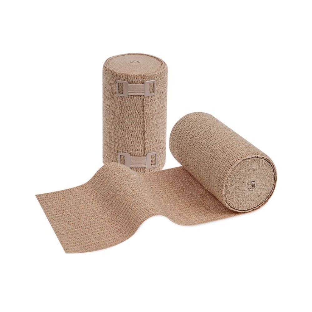 Ausgestellt sind zwei Rollen der Meditrade ABE Ven® kräftig dauerelastische Langzugbinde; eine aufrecht stehend und eine teilweise abgerollt, so dass die Textur sichtbar ist. Auf der aufrecht stehenden Rolle sind Metallklammern zur Fixierung der Binde zu sehen, die eine optimale Passform bei Venen- und Lympherkrankungen gewährleisten.