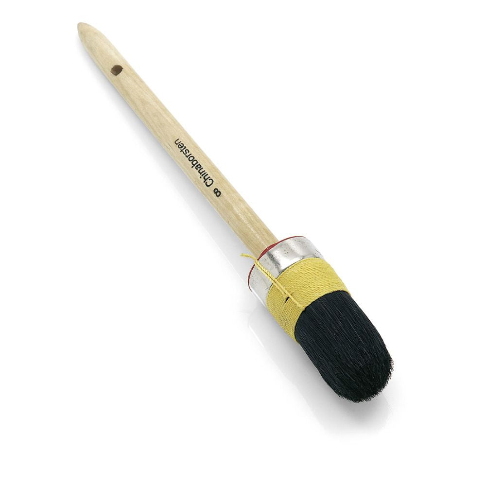 The Nölle Profi Brush Craftsman Ring Brush from Nölle Profi Brush Brush & Paintbrush Technology e.K. features a wooden handle with a black bristle mix for painter quality. A metal ferrule wrapped with yellow thread and a convenient hole at the end make storage easier.
