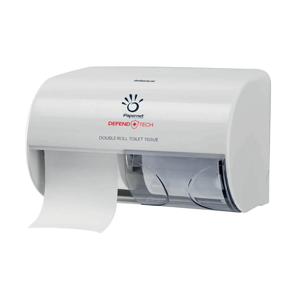 A white Papernet The Dual Topa small-roll dispenser from Sofidel Germany GmbH is made of antibacterial plastic. It features the brand logo and the words “Defend Tech Technology” on the front, with a roll of toilet paper partially extending from the slot.