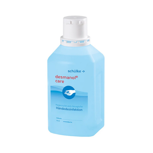Eine Flasche Schülke desmanol® care Händedesinfektionsmittel von Schülke & Mayr GmbH mit weißem Verschluss und Etikett in den Farben Blau und Weiß, auf dem Produktverwendung und Marke angegeben sind. Die Flüssigkeit im Inneren scheint