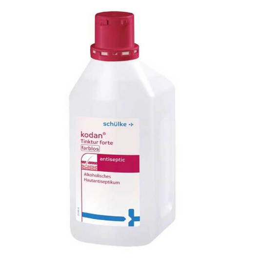 Eine Flasche schülke kodan® Tinktur forte Hautantiseptikum, farblos Lösung der Schülke & Mayr GmbH. Die Flasche ist weiß mit einem roten Verschluss und Etikettendetails in Blau, Rosa und schwarzem Text.