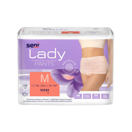 Eine Verpackung der saugfähigen Unterwäsche Seni Lady Pants in Größe Medium, die für Inkontinenz entwickelt wurde, zeigt ein Bild des Produkts an einem weiblichen Model. Die Verpackung hebt Eigenschaften wie Atmungsaktivität und Sicherheit hervor. Das Produkt ist von der TZMO Deutschland GmbH.
