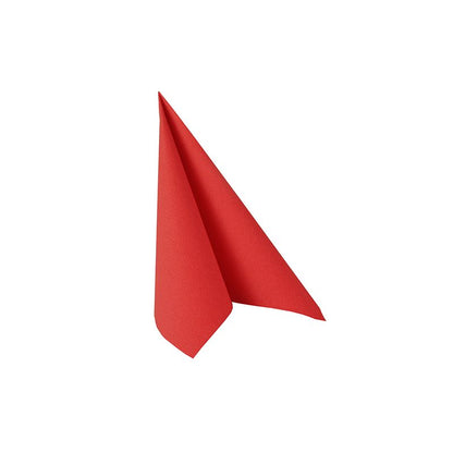 A single red PAPSTAR 20 napkins "ROYAL Collection" 1/4-fold (40x40 cm) from PAPSTAR GmbH is folded upright into a pointed triangle on a white background - ideal for a stylish table decoration.