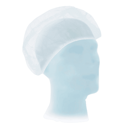 A transparent mannequin head with a white, disposable Meditrade Suavel® Astrid nurse cap XL made of polypropylene nonwoven fabric against a green background.