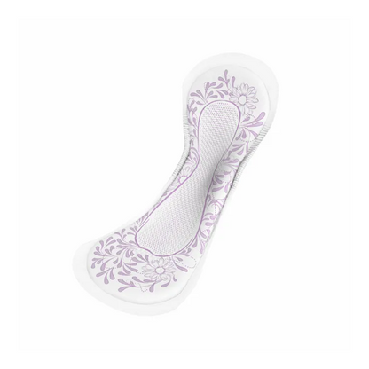 A detailed image of a TENA Discreet Normal Night incontinence pad, showing its white base with light purple floral patterns on the sides. This pad was developed by TENA – Essity Germany GmbH for bladder weakness protection and features a textured center to enhance absorbency.
