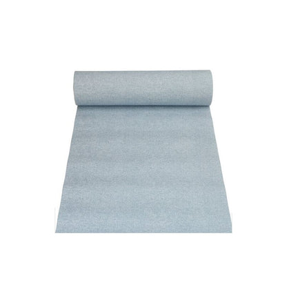 A roll of light blue fabric from the PAPSTAR table runner fabric-like PV-Tissue Mix "ROYAL Collection" of PAPSTAR GmbH is partially unrolled and elegantly presented on a white background. The pulp-viscose-tissue mix gives it a smooth and evenly colored appearance.