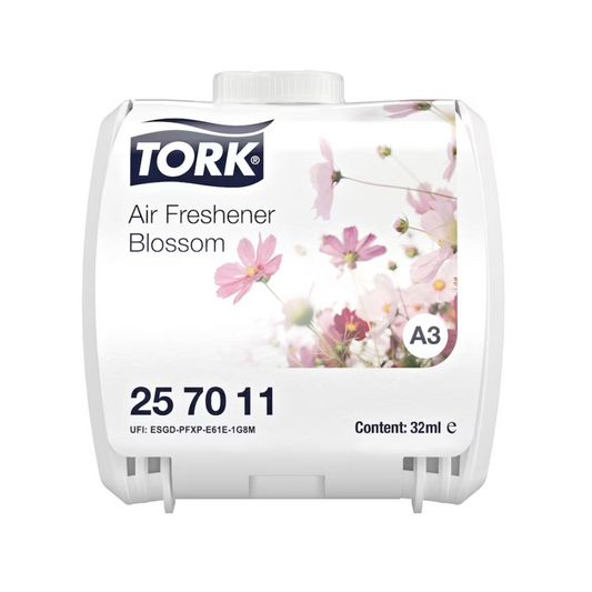 Ein Frontbild eines TORK Tork Kontinuierlicher Lufterfrischer, verschiedene Düfte Lufterfrischers mit der Aufschrift „Air Freshener Blossom“. Der weiße Behälter zeigt Blumenbilder und Produktinformationen wie den Code „25 70 11“, das Volumen „32 ml“ und die Bezeichnung „A3“.