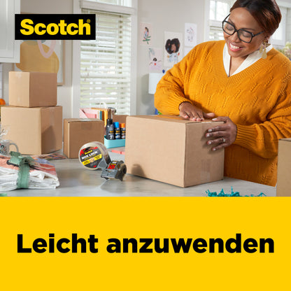 Eine Frau in einem orangefarbenen Pullover verschließt in einem hellen Raum einen Karton mit Scotch® Box Lock™ Verpackungsklebeband 48 mm x 20,3 m von 3M Deutschland GmbH. Auf dem Tisch stehen Kartons, Klebebandabroller und eingepackte Geschenke. Der Text lautet: "Leicht anzuwenden.